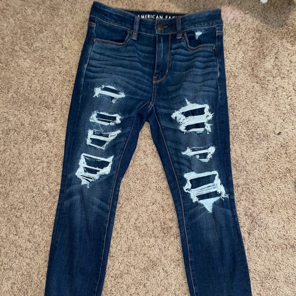 skinny jeggings, built in patches behind rips